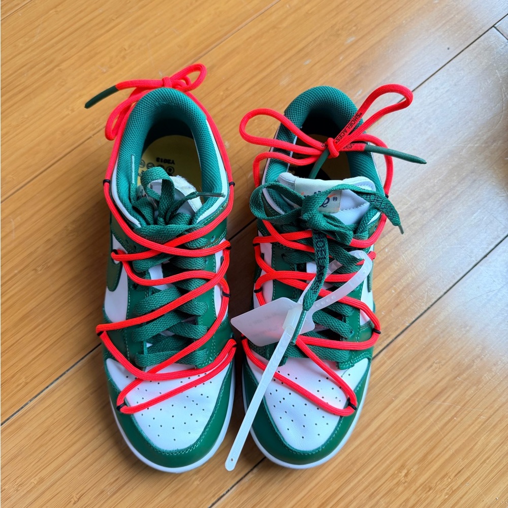 Nike Green and White Low-Top Sneakers with Red Accent